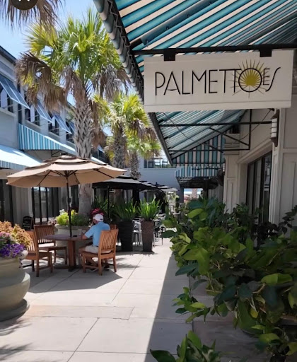 Visitors enjoying a relaxed Labor Day weekend of coffee, shopping, and dining at The Shops at Sea Pines Center